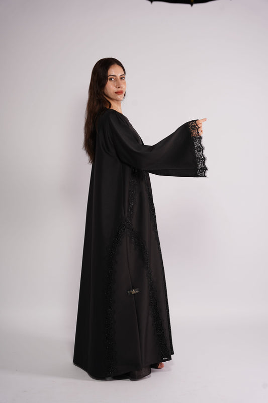 Abaya styled in black lace