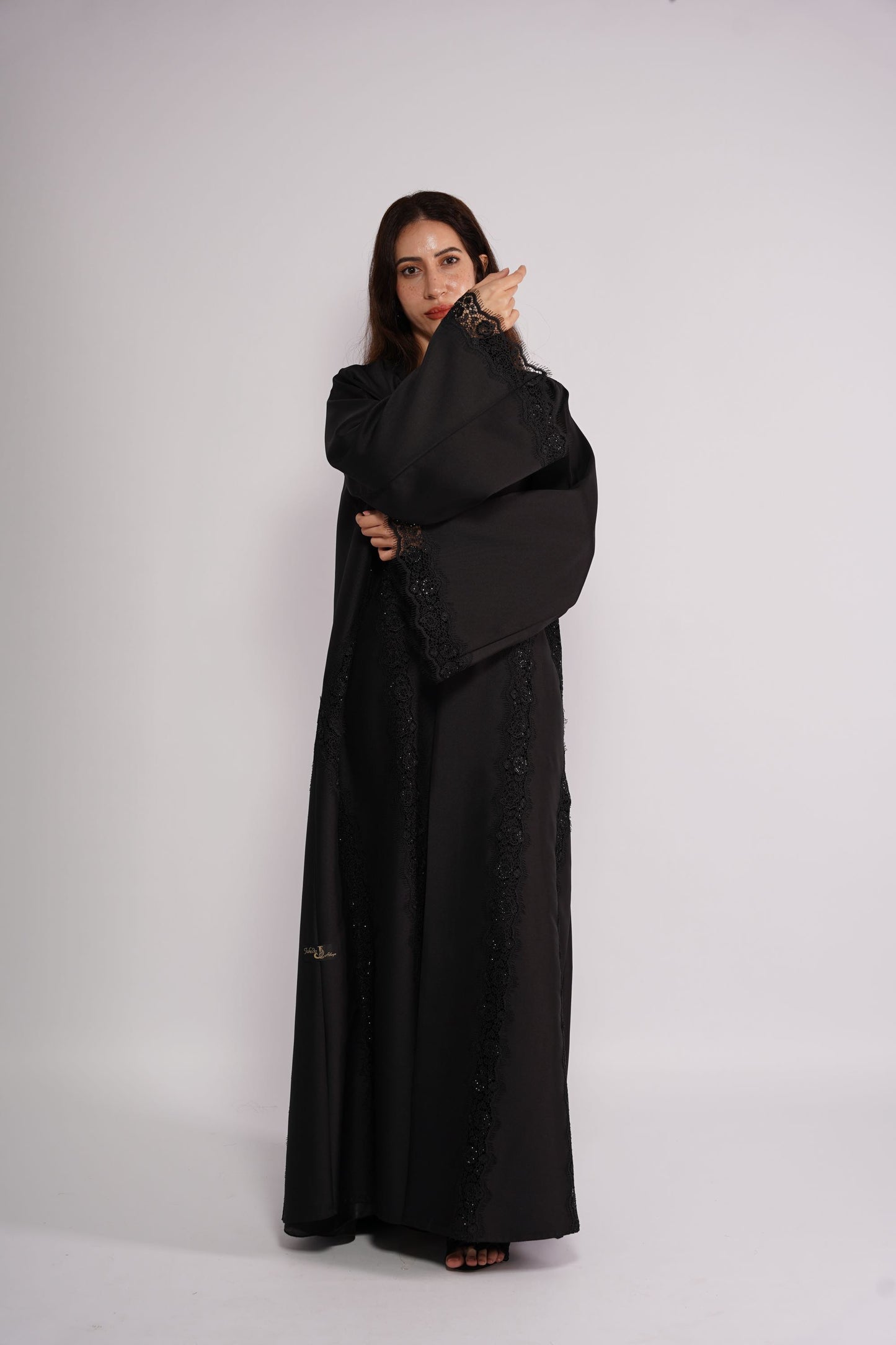 Abaya styled in black lace